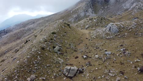 Μajestic-mountain-landscapes,-with-stunning-valleys,-and-rugged-terrain-|-Aerial-Flight-Footage-of-Greek-mountains-in-the-Peloponnese-region