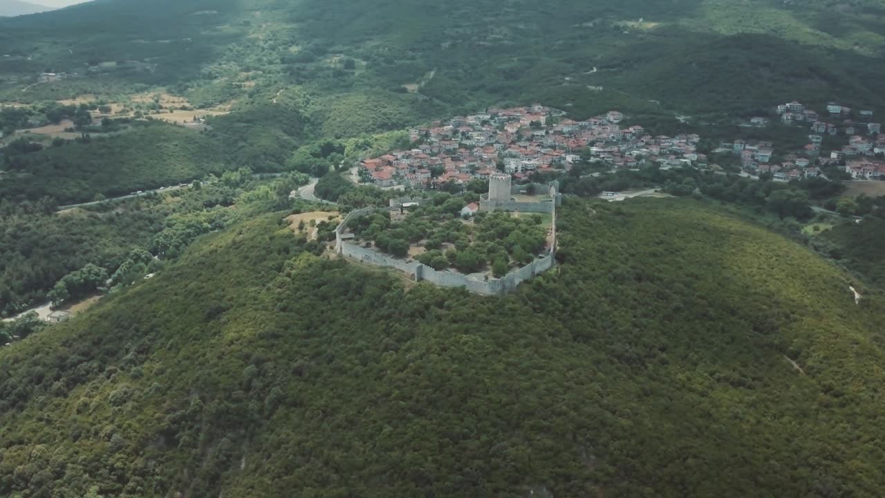 Aerial View of a Historic Hillside Town with Castle