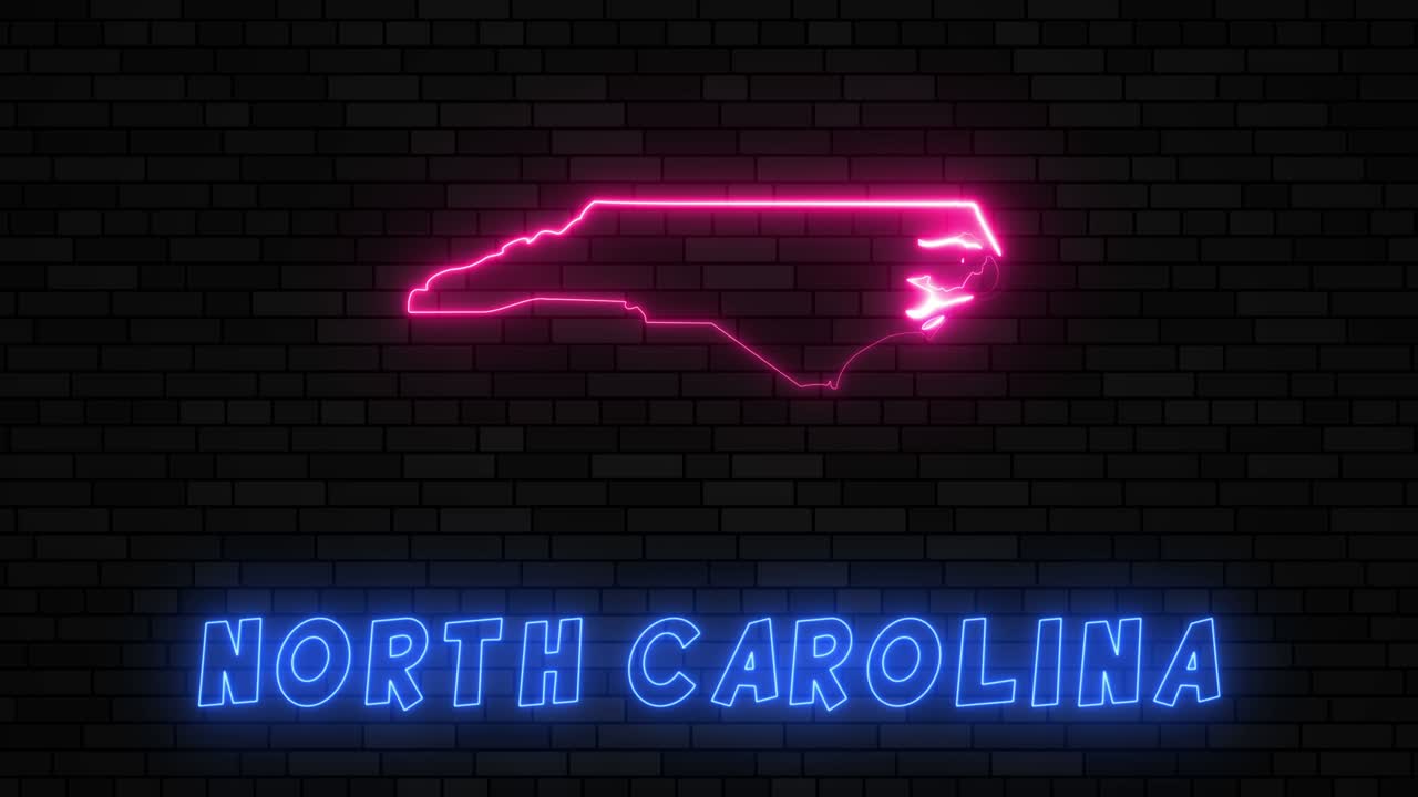 State of North Carolina map silhouette with neon line on a dark brick wall background