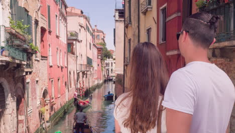 couple in venice canal view