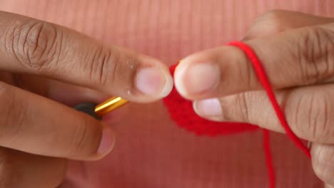 crocheting a red heart