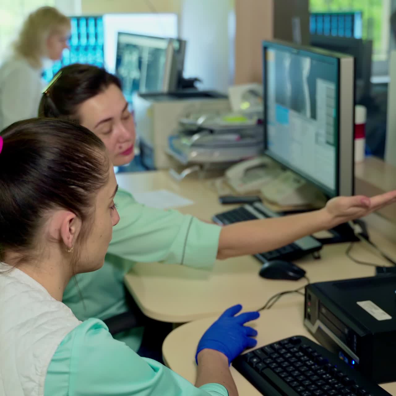 Doctors reviewing x-rays