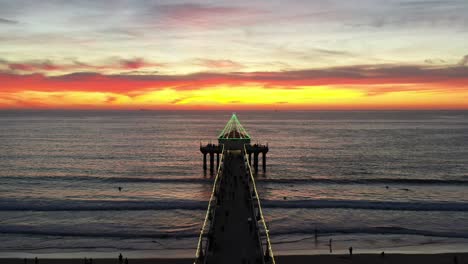 roundhouse aquarium at manhattan beach pier decorated with christmas lights during holiday season