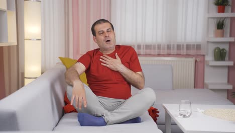 man with shortness of breath is breathing hard.