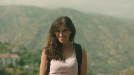 Portrait-of-attractive-caucasian-ethnicity-young-woman-outdoor-background,-Smiling-and-laughing-at-camera