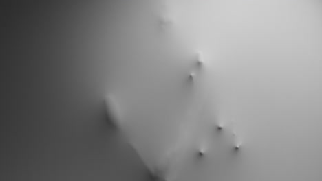 a scary silhouette of a man appears from the white wall