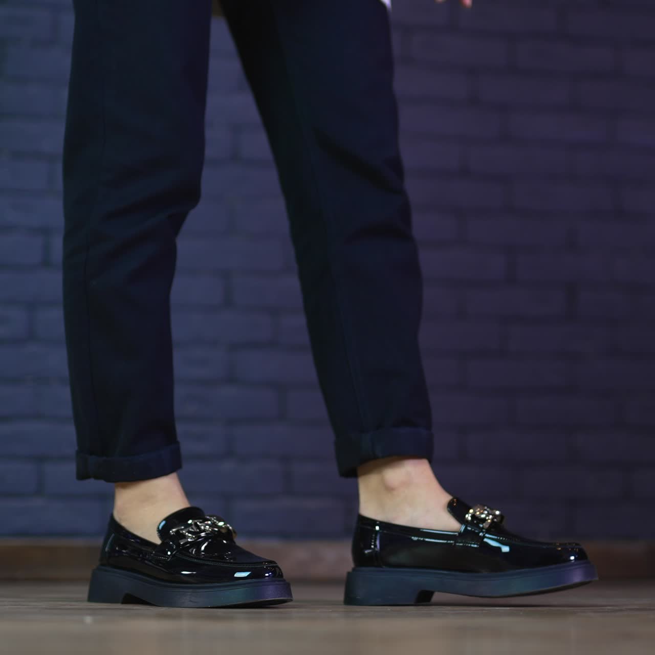 Lifestyle footwear dancing on the floor. Close up view of shoes dancing