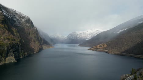 fjords in norway during winter in the morning with mist