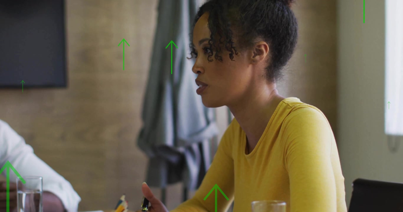 Animation of arrows and data processing over diverse business people in office