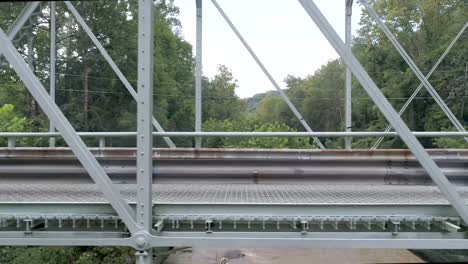 using a drone i was able to capture the side view of a bridge in the middle of no where's