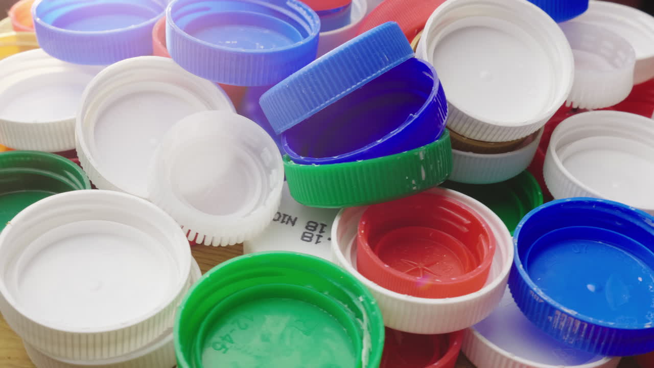 Many Plastic Bottle Caps Recyclable And Recyclable Plastic Waste Concept Free Stock Video