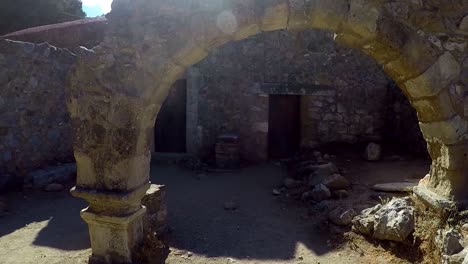 walking towards an old church in paleo pili an historical site on the island of kos in greece