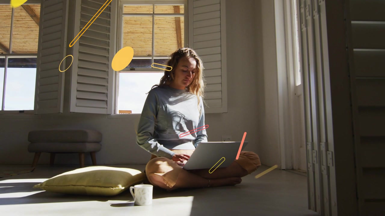 Vertical video: Woman opening laptop, shapes drifting, growing across scene, showing workflow