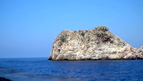 tourist ships on the background of the island