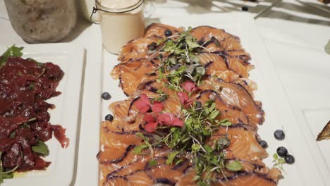 gravlax with blueberries and flowers