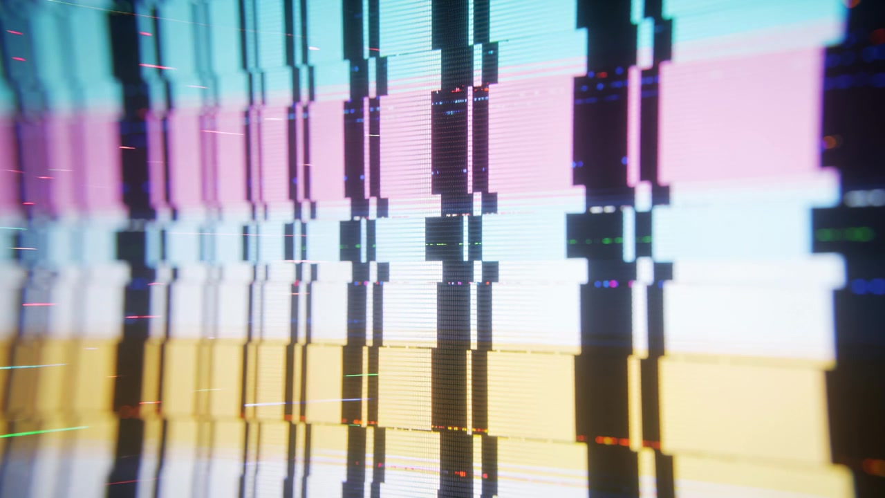 Flickering close-up digital display showing colored blocks and columns jittering on playback