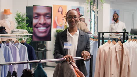 employee working in mall clothing store