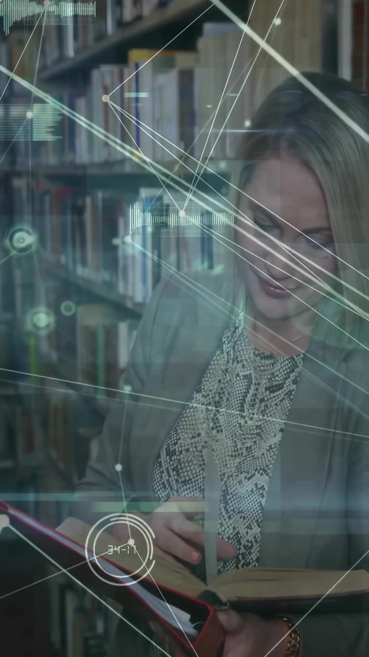 Vertical video: Woman scanning pages at library for research, looking down as HUD lines cross hands