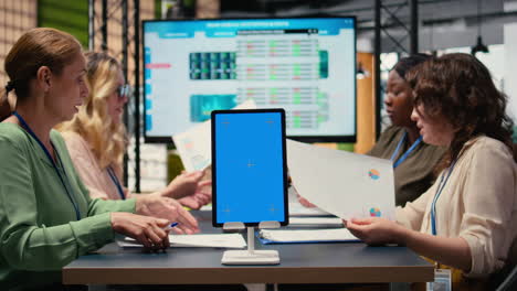 vertical video businesswomen use a copy space display and charts to pitch career vision