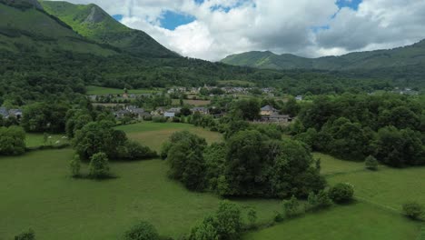 Aerial-view-over-the-lush-countryside-on-the-foothills-of-the-Pyrenees-mountains-close-to-Lourdes