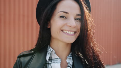 Smiling Woman in a Black Hat