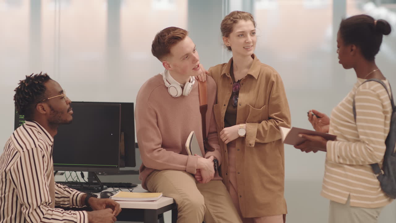 Group of IT Students Talking in Class