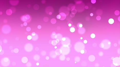 el fondo de partículas de brillo borrosas de colores que caen