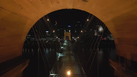 aerial night flythrough suspension bridge tower, cincinnati, ohio