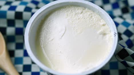 close-up of a cup of creamy yogurt