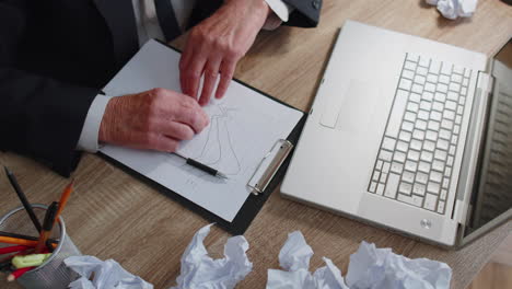 tired sleepy overworked senior business man falling asleep sit at home office desk with laptop