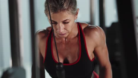 woman working out on a cable machine