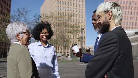 group of diverse business people having a meeting in the city