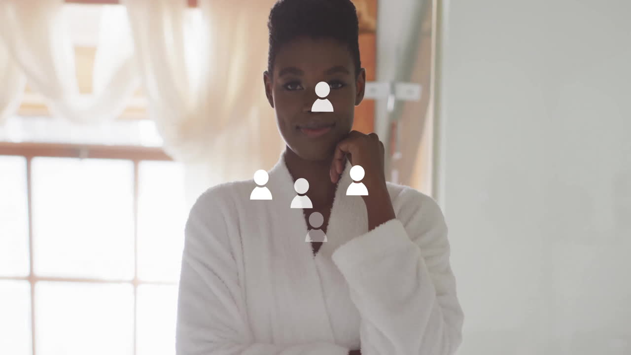 Standing confidently, person in white robe with animation of social media icons