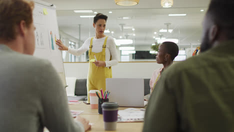 Diverse-group-of-male-and-female-business-colleagues-working-in-office