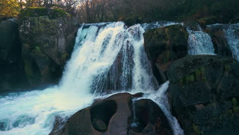 cascades over fervenza da noveira nature preserve in a coruña, spain