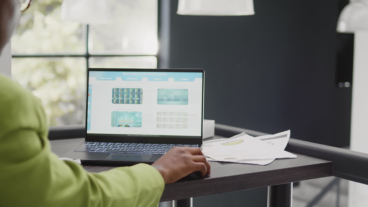 Businesswoman Working on Laptop in Modern Office