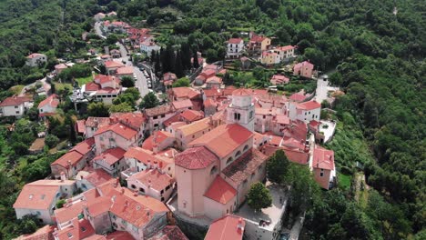 the famous medieval hilltop fortress village of motovun, croatia in central istra, aerial dolly pull