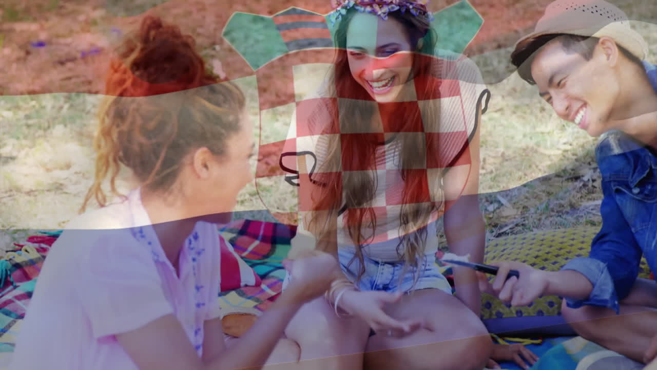 sentado en la manta, amigos riendo y viendo formas geométricas animación