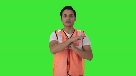 Indian-airport-ground-staff-worker-talking-Green-screen