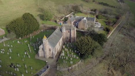 aerial footage of arbuthnott church on a sunny day, aberdeenshire, scotland