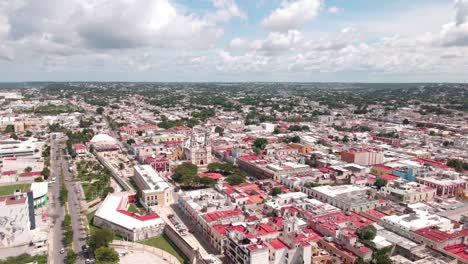 flying over the main plaza of the walled city of campeche