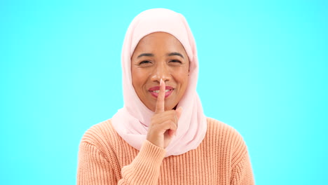 Muslim-woman,-finger-on-lips