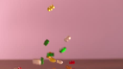 gummy bears falling to a counter in a studio