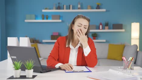 Home-office-worker-woman-falling-asleep.