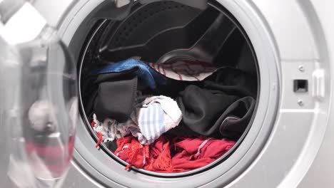 washing machine with dirty clothes