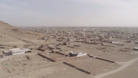 aerial footage of tunisian residential districts in an arid climate