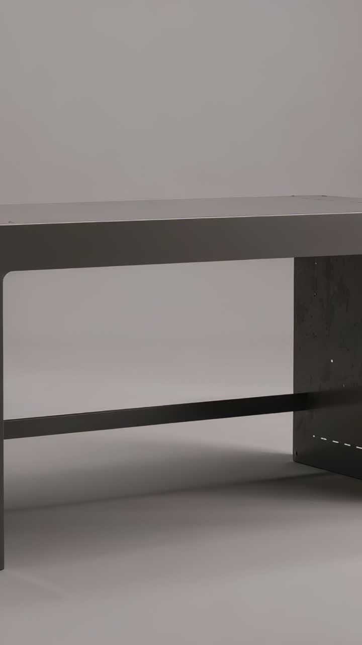 Video verticale: carrellata che rivela una panca bassa e scura che si sposta in studio, mostrando i fori per i dispositivi di fissaggio