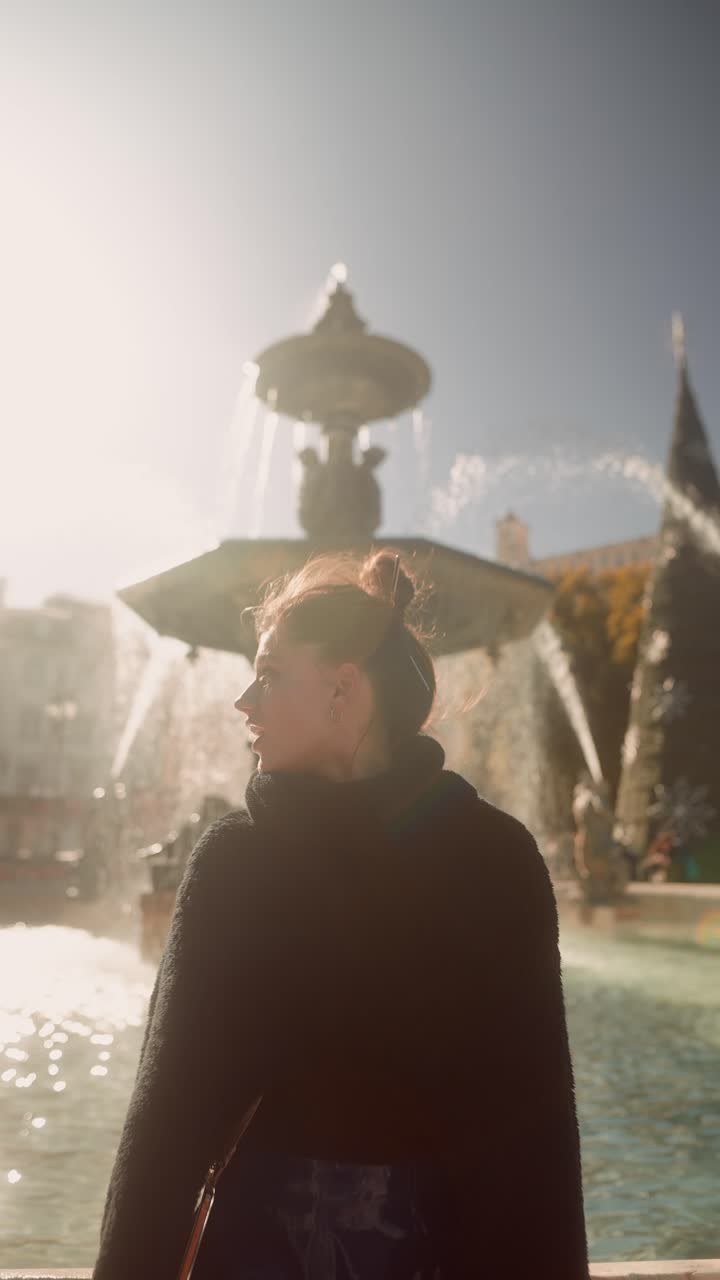Woman in Lyon by a Fountain