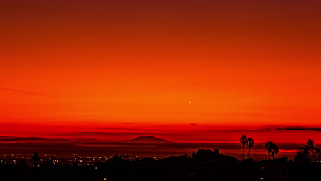 time lapse, night above los angeles usa, lights and clouds above red skyline