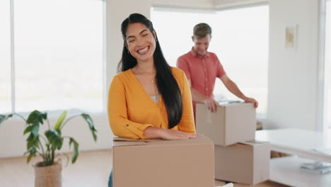 Boxes,-moving-and-face-of-a-woman-in-her-new-home